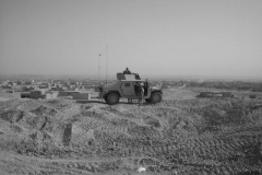 Cpl-Romero-with-gun-truck-providing-security